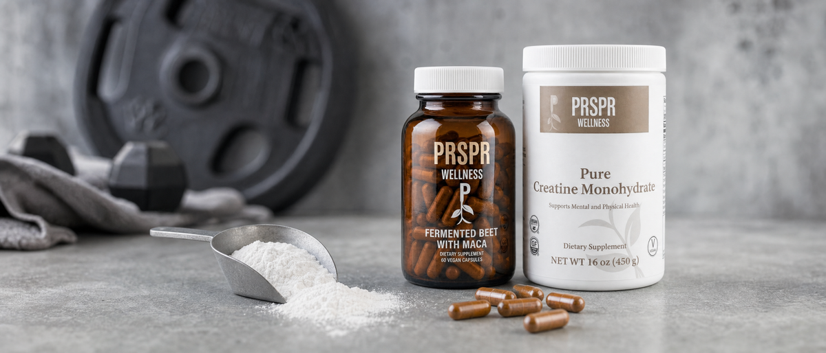 PRSPR Pure Creatine Monohydrate 16 oz tub and Fermented Beet with Maca capsules beside a scoop of micronized creatine powder