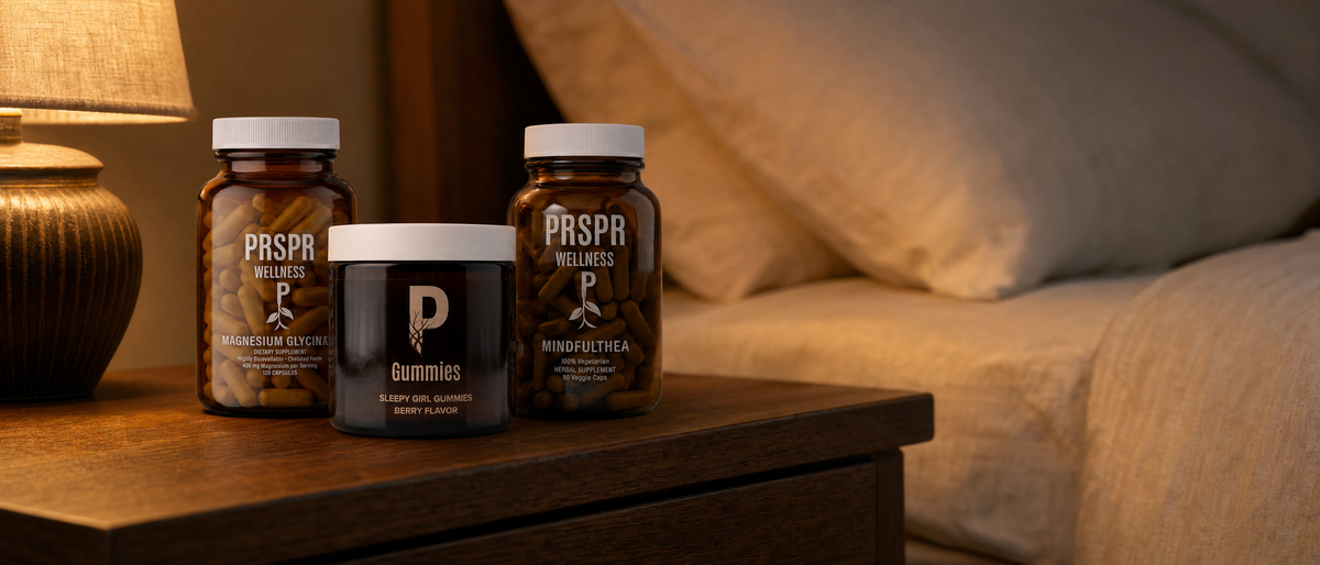 Sleepy Girl Gummies, Magnesium Glycinate and MindfulThea bottles grouped on a nightstand under warm lamplight