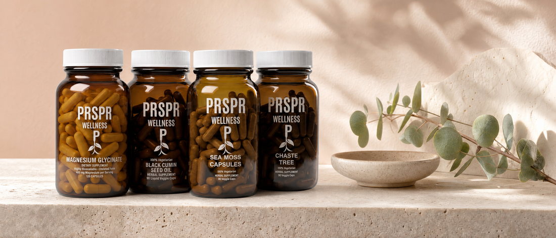 PRSPR Magnesium Glycinate, Black Cumin Seed Oil, Sea Moss Capsules and Chaste Tree bottles on a travertine ledge