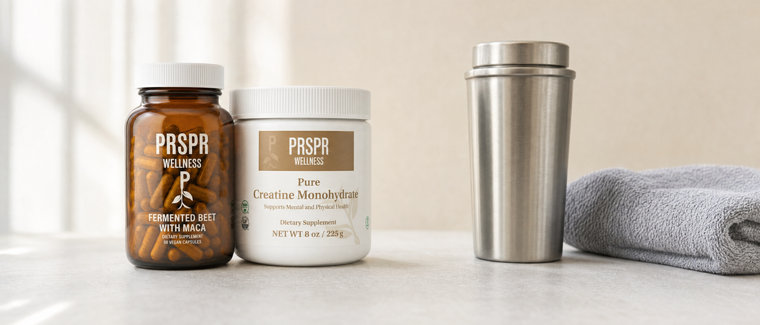 PRSPR Wellness Nature's BBL fermented beet with maca bottle and creatine tub on a kitchen counter