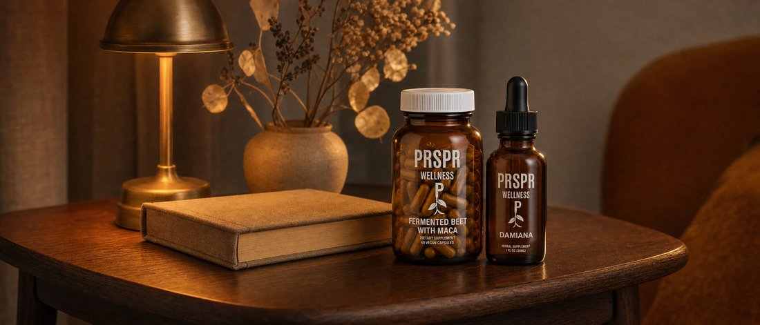 PRSPR Love Bundle products on a walnut side table beside an antique book in warm lamplight