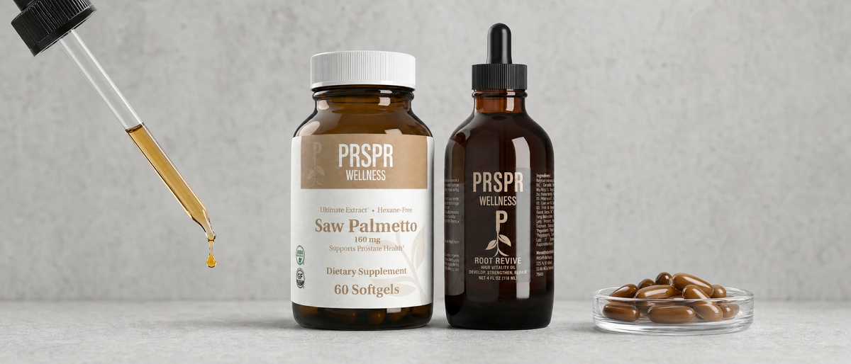 PRSPR Hair Harmony Kit on concrete between an oil dropper and a dish of capsules