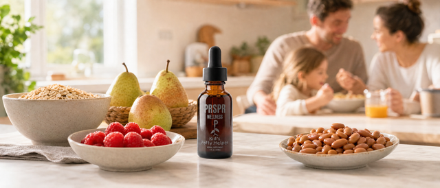 PRSPR Kids Potty Helper on a kitchen table beside bowls of raspberries oats and pears