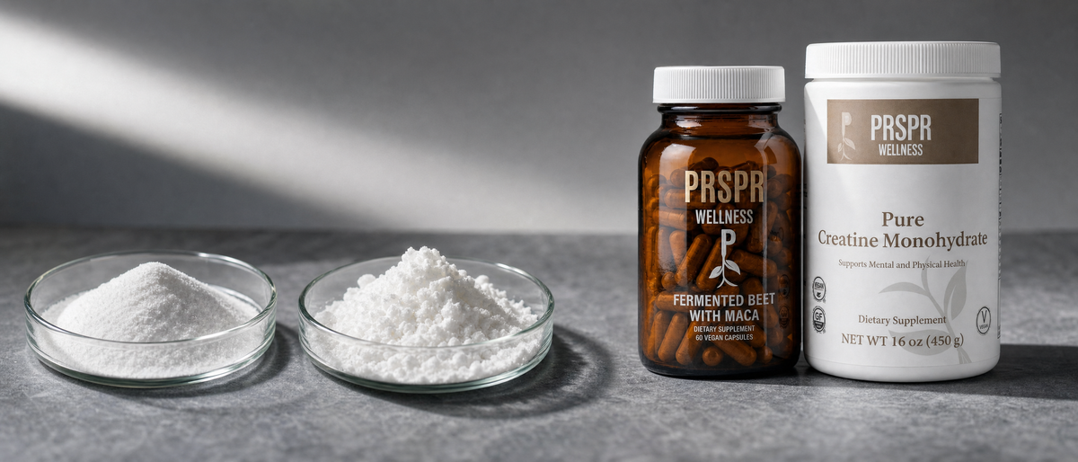 PRSPR Wellness Nature's BBL Deluxe set on graphite slate beside two glass dishes of fine white crystalline powder