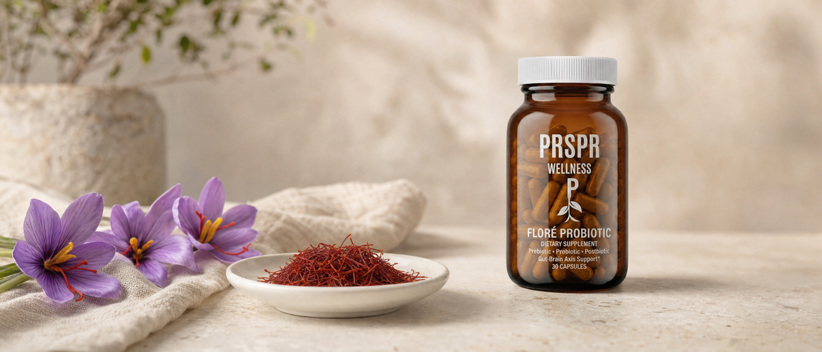 PRSPR FLORÉ Probiotic capsule jar beside a dish of dried saffron threads and purple saffron crocus flowers