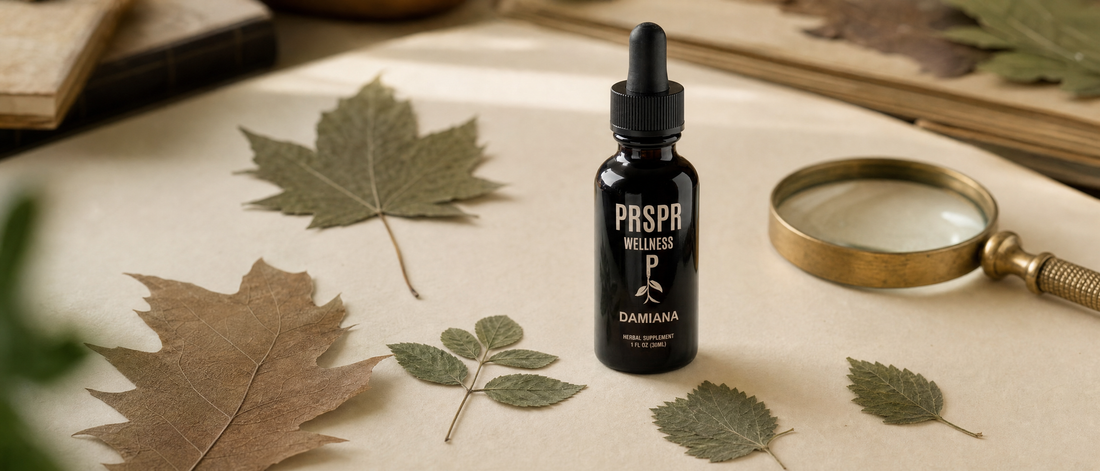PRSPR Wellness Damiana dropper bottle on a botanist's worktable among pressed leaves of different types, including large lobed leaves, a small compound leaf and small toothed leaves, beside a brass hand lens